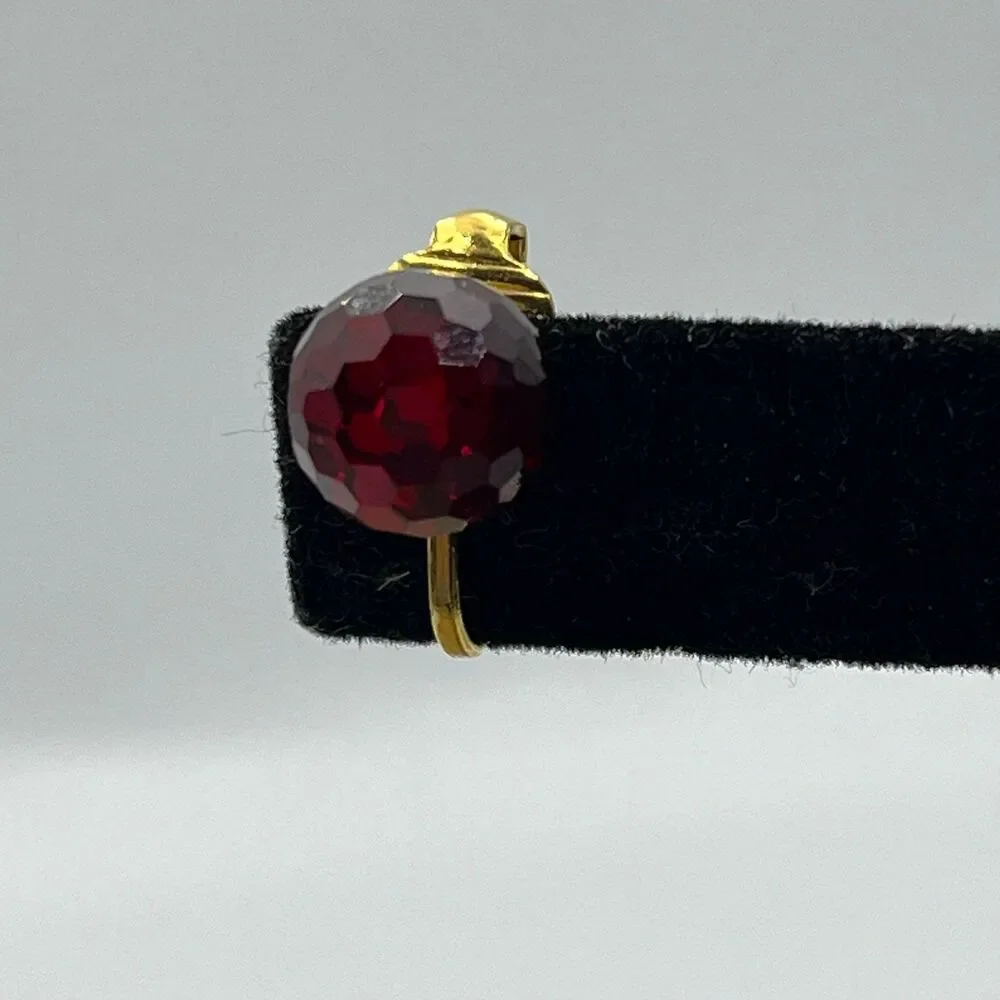 Vintage red glass multi faceted gold tone clip on earrings